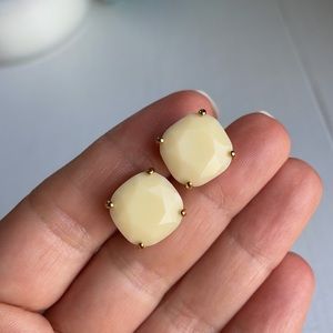 Kate Spade cream earrings in gold settings